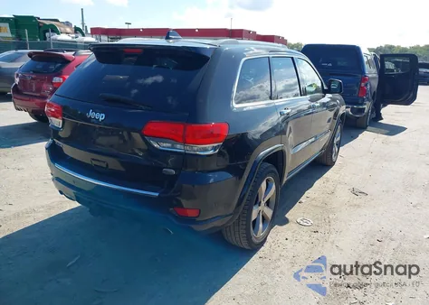 2014 Jeep Grand Cherokee Overland z USA, uszkodzony, nr VIN 1C4RJFCG8EC122627